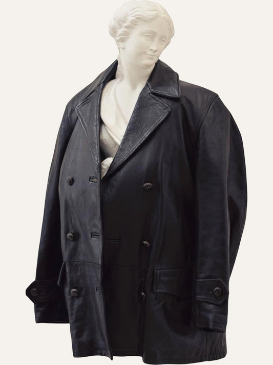 Anemoia Vestiaire black genuine leather mid-length trench coat with double-breasted button closure and notched lapels.