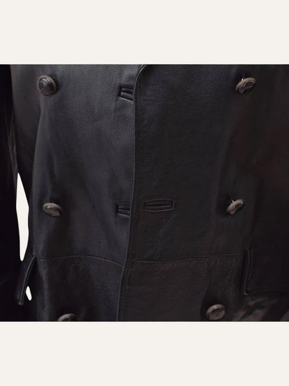 Anemoia Vestiaire black genuine leather trench coat with double-breasted button closure and vintage detailing.
