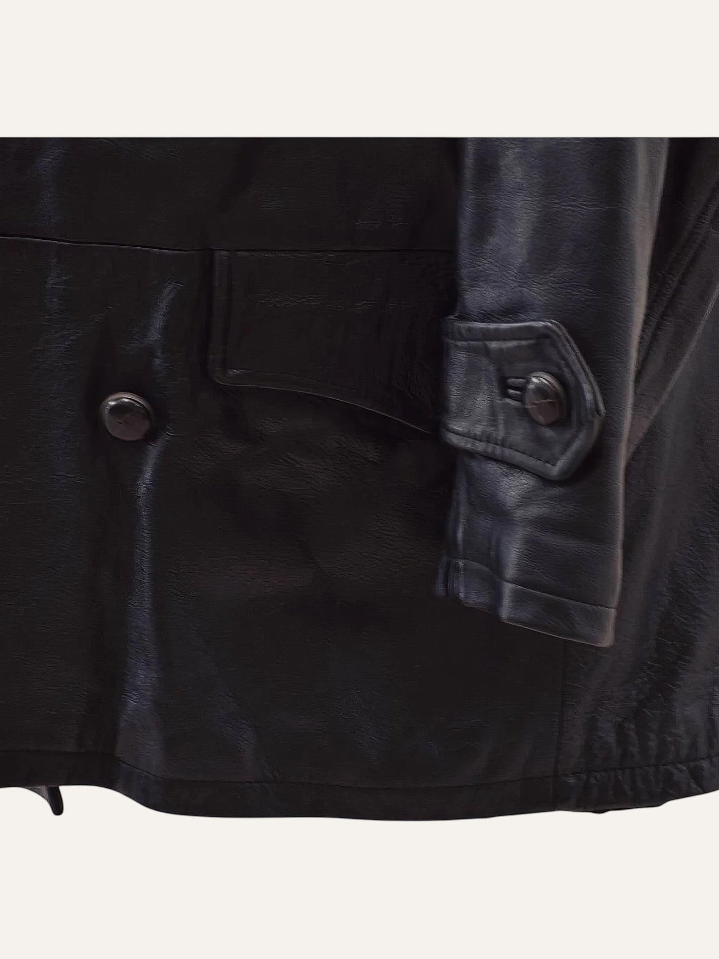 Anemoia Vestiaire black genuine leather trench coat with button closure and flap pocket detail.