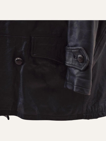 Anemoia Vestiaire black genuine leather trench coat with button closure and flap pocket detail.