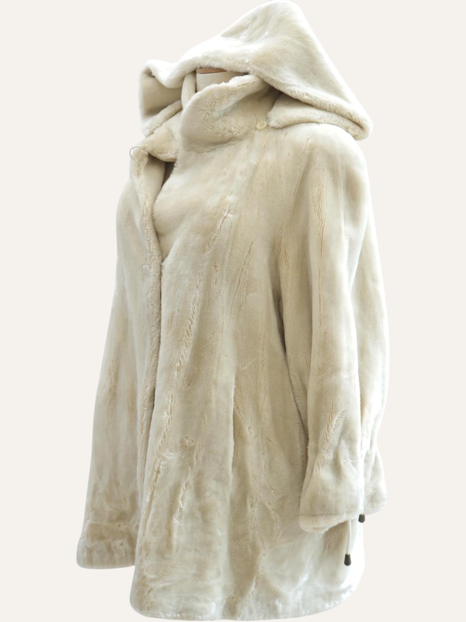 Anemoia Vestiaire ivory white hooded faux fur coat with a soft texture and full-front closure. Luxurious vegan winter jacket.