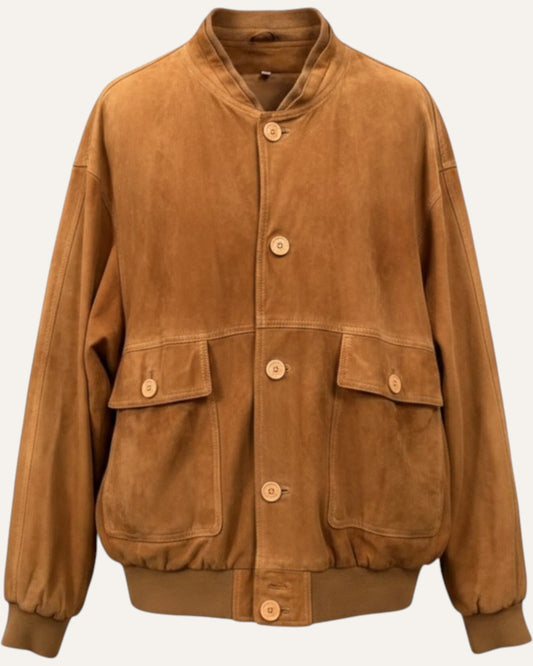 Anemoia Vestiaire camel-tan suede bomber jacket with button front, flap pockets, and ribbed cuffs/hem.