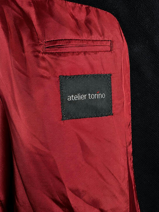 Atelier Torino label and burgundy lining inside the cashmere blazer