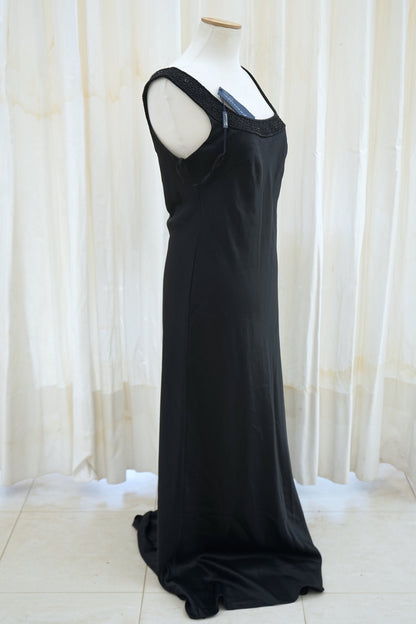 Black satin evening gown with open back