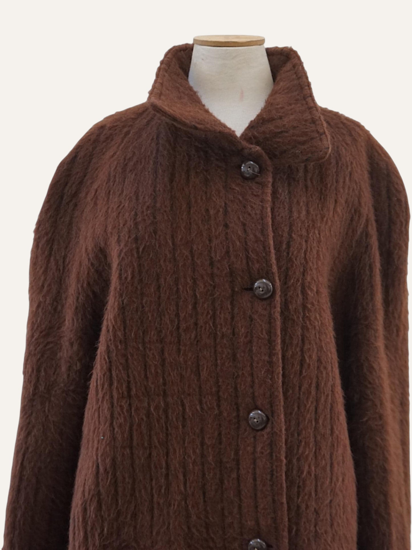 Minimalist wool boucle coat, side view