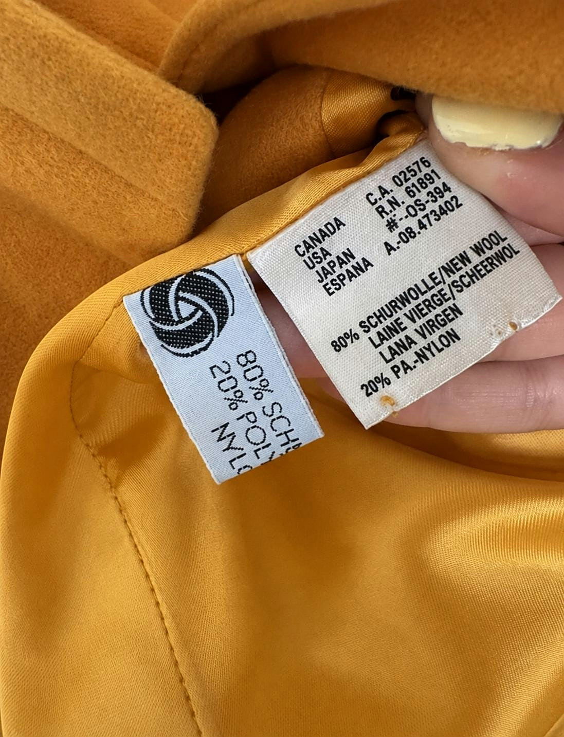 Composition label reading 80% new wool, 20% nylon