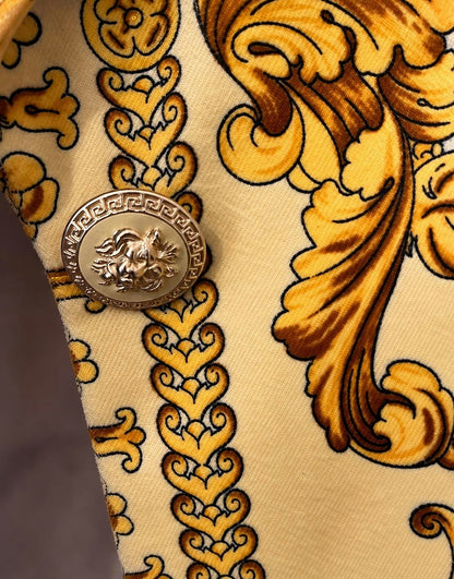 Baroque print detail with embossed gold-tone button on the Kamosho Paris blazer
