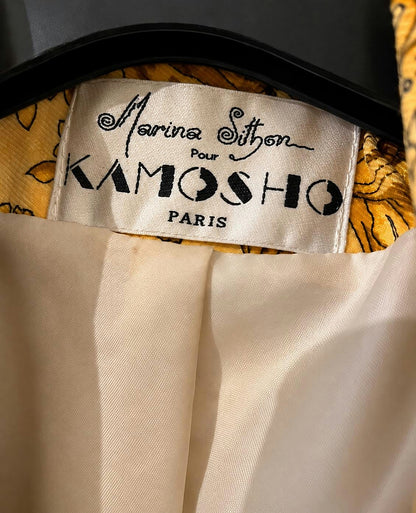 Interior label reading Marina Sitbon pour Kamosho Paris