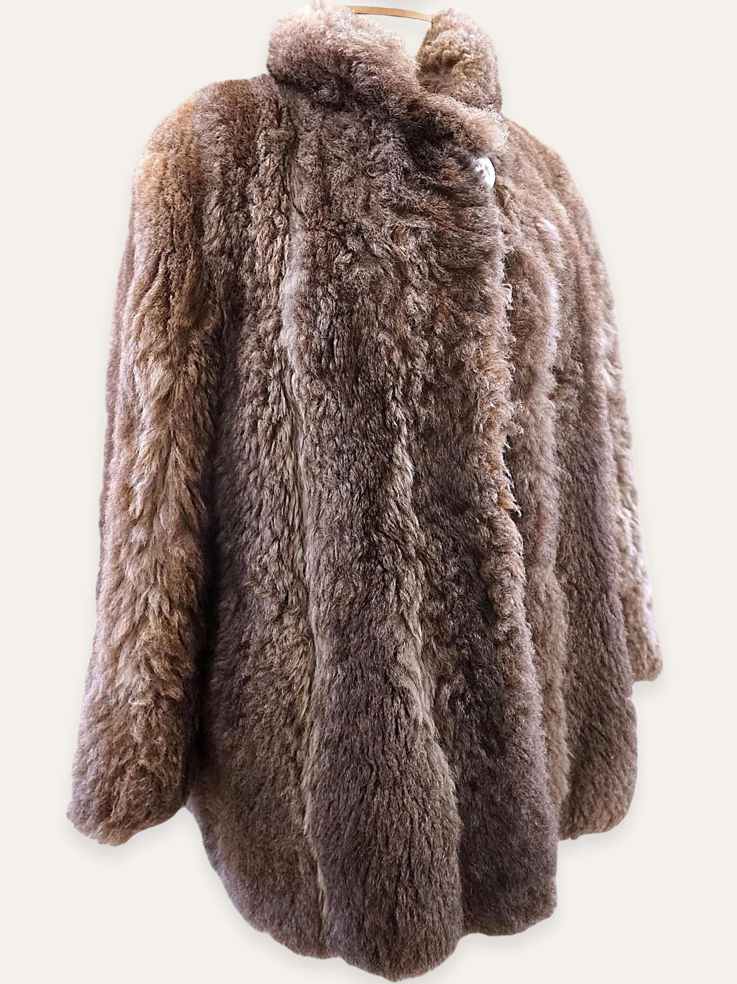 Vintage fluffy real fur coat in mushroom beige-brown, front view