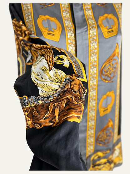 Detail of the silk print with lyre and French horn motifs