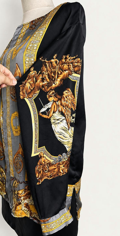 Side view of the silk blouse showing its fluid drape