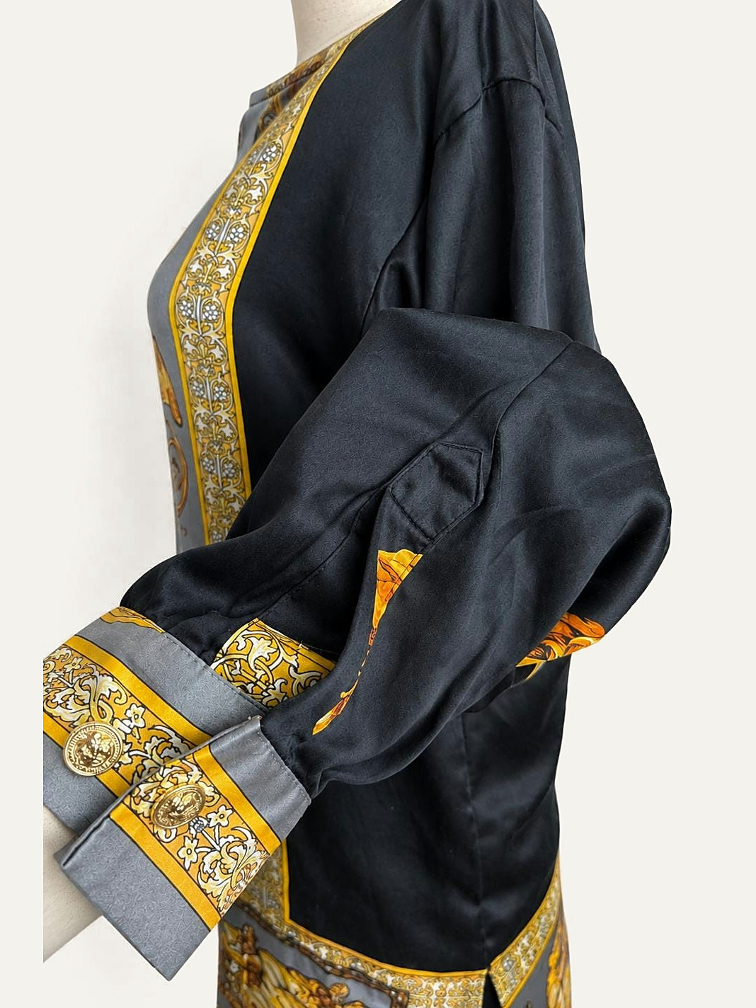 Sleeve and cuff of the baroque musical print silk blouse