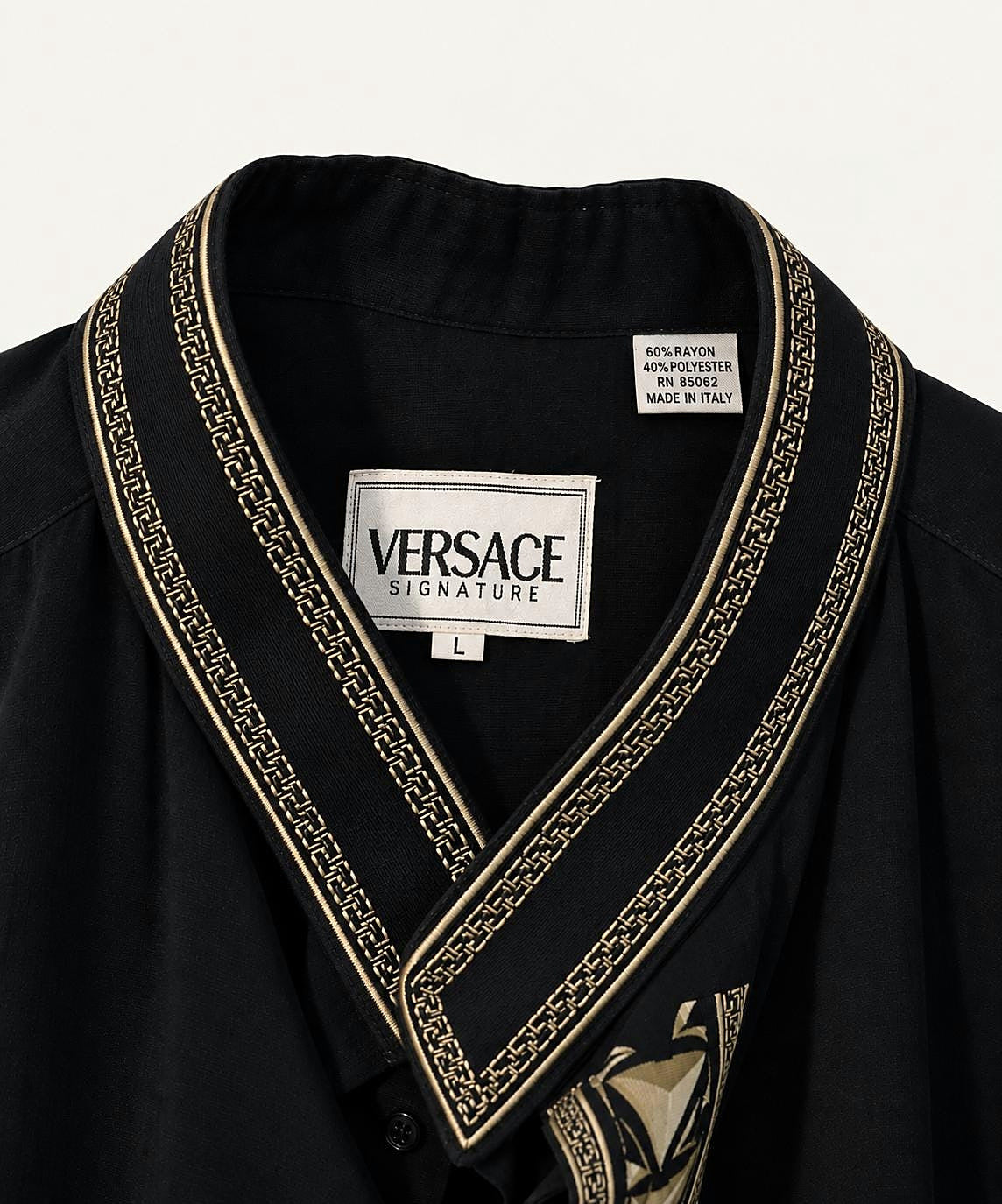 Versace Signature label and gold-tone neckline trim, made in Italy