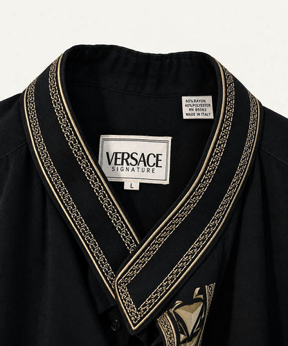 Versace Signature label and gold-tone neckline trim, made in Italy