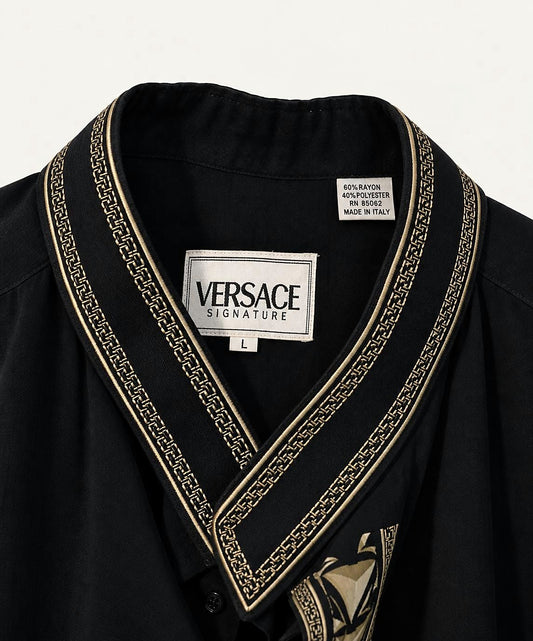 Versace Signature label and gold-tone neckline trim, made in Italy