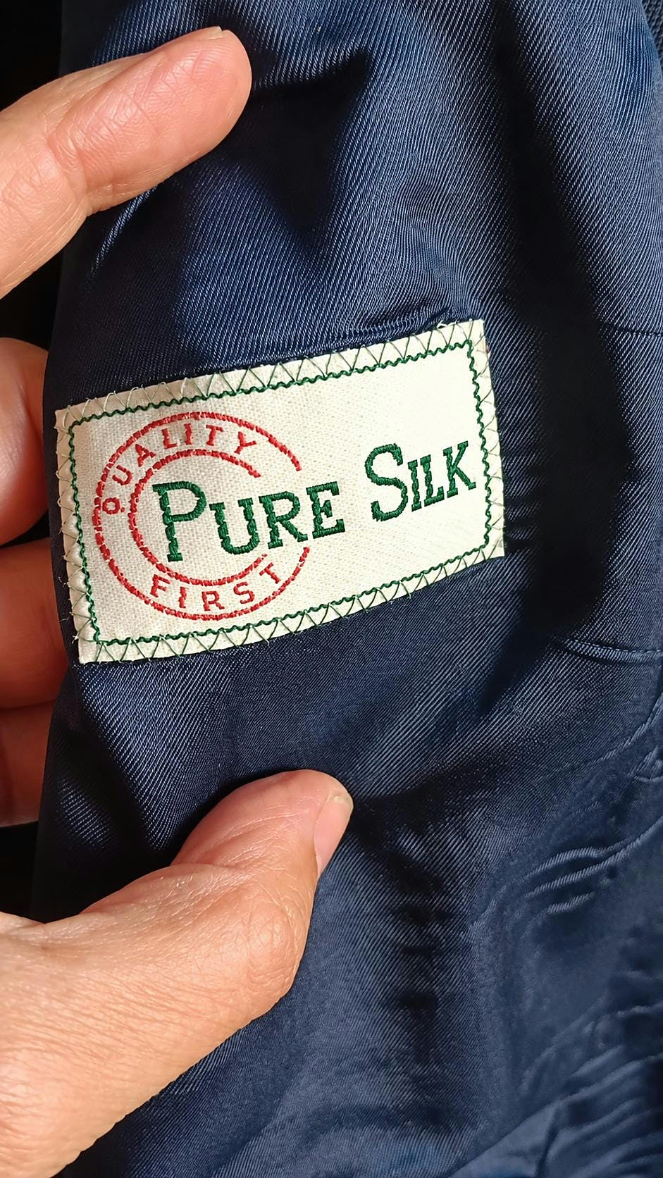 Interior label reading Pure Silk, Quality First